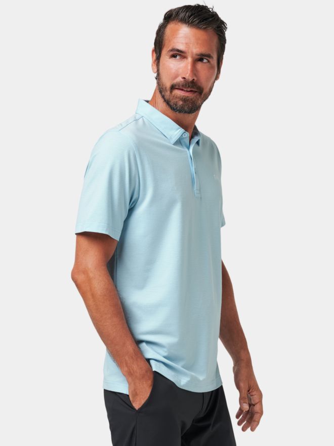 TravisMathew The Heater Halbarm Polo hellblau