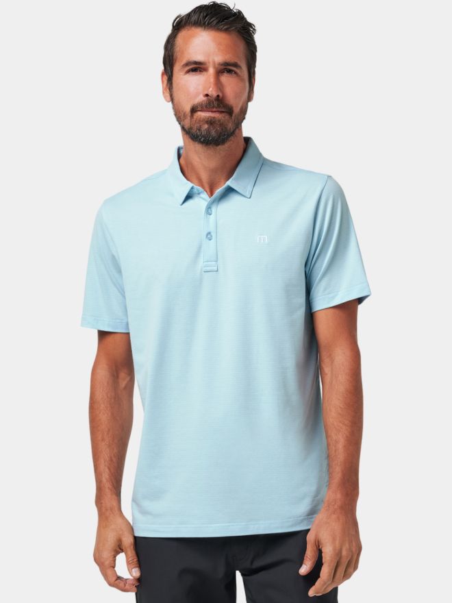 TravisMathew The Heater Halbarm Polo hellblau