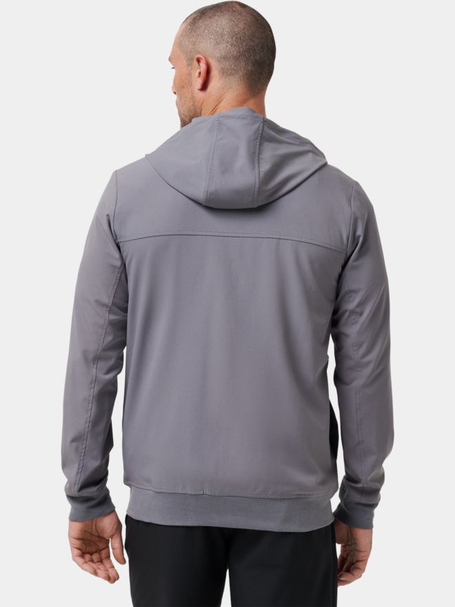 TravisMathew Strečová bunda WANDERLUST HOODIE šedá