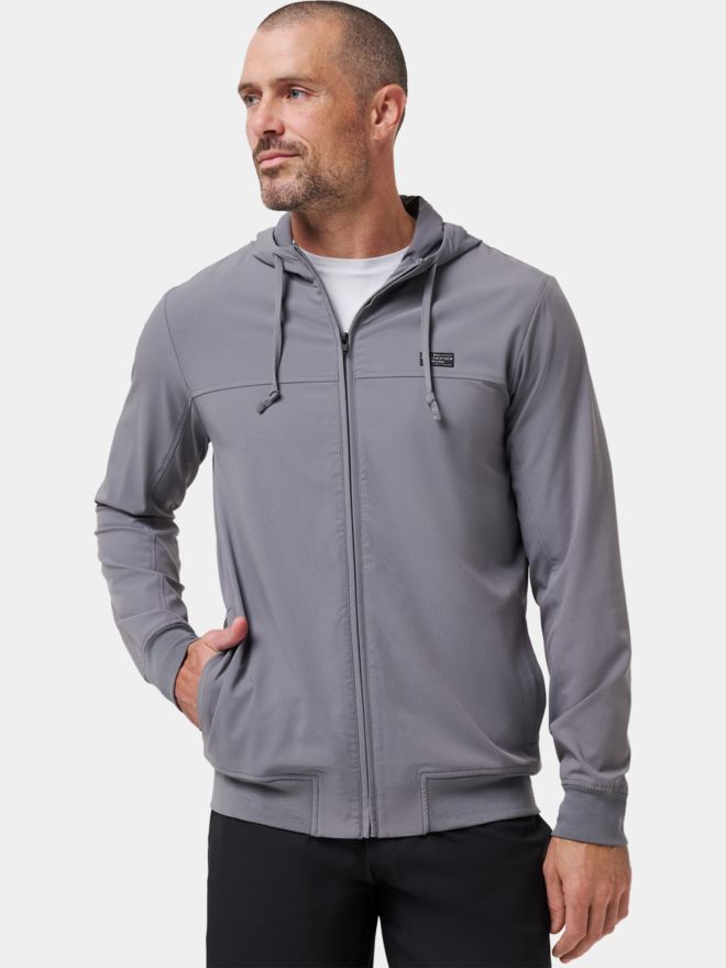 TravisMathew Strečová bunda WANDERLUST HOODIE šedá