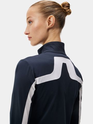 J.Lindeberg  Strečová bunda Janice Mid Layer námořnická modrá