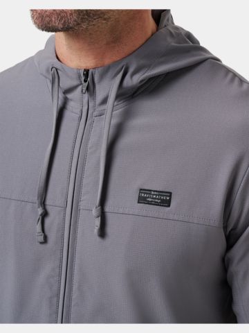 TravisMathew Strečová bunda WANDERLUST HOODIE šedá